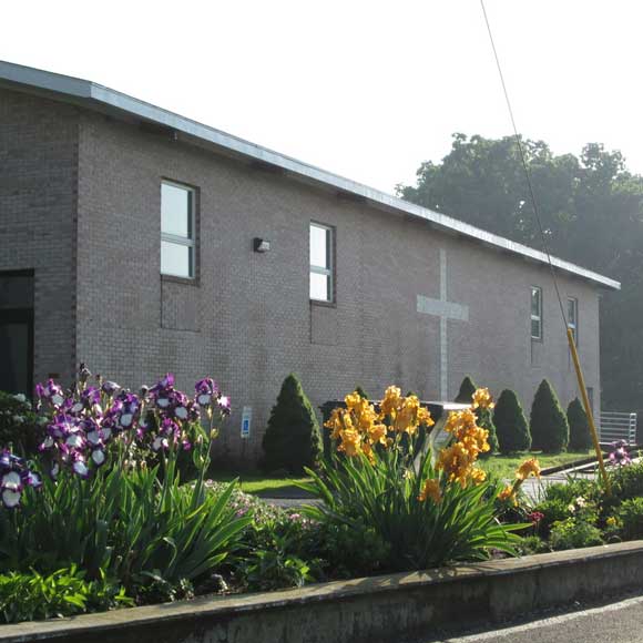 Side of church and beautiful landscape flowers