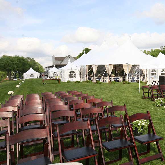 Outdoor rows of seating for a outside wedding